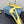 CUT-OUT BALLERINA FLAT IN LIGHT YELLOW SATIN ATTACHED BEAD BUCKLE