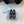 BALLERINA PUMPS WITH TRIANGLE LOGO AND BOW IN BLACK CALFSKIN