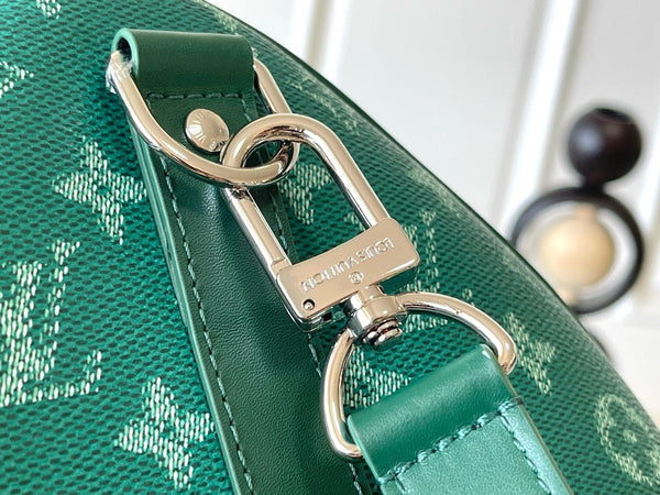 KEEPALL BANDOULIÈRE 50 IN GREEN MONOGRAM HERITAGE CANVAS