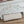 HERBAG ZIP 31 RETOURNE PEGASE POP BAG IN OFF-WHITE MIX RED CANVAS AND HUNTER COWHIDE