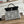 HERBAG ZIP 31 LAQUERED BAG IN OFF-WHITE MIX BLACK H PLUME CANVAS