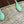 SMALL TOTE BAG 26 WITH LOGO IN NATURAL-COLORED STRAW AND LIGHT GREEN CALFSKIN HANDLE