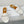 ALAIA FLAT MULE IN WHITE GLOSSY LAMBSKIN
