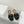 ALAIA FLAT MULE IN BLACK GLOSSY LAMBSKIN