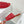 ALAIA VIENNE FLAT MULES IN CHERRY RED LAMBSKIN