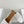 ALAIA VIENNE FLAT MULES IN WHITE LAMBSKIN