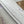 POCHETTE METIS EAST WEST 21 IN WHITE PURPLE MONOGRAM EMPREINTE LEATHER