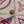 FÉLICIE POCHETTE 21 IN CORAL MONOGRAM TILES CANVAS