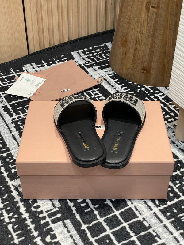 Miu 25S Beige and Black Canvas and leather slides 227133
