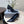 CURVED HEEL SHALLOW MOUTH PUMPS IN BLACK CALFSKIN