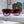 MONOGRAM SUNGLASS 581385 IN RED ACETATE FRAME