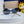 MONTAIGNE SUNGLASS 563194 IN GOLD METAL GREY LENSES