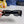 TRIOMPHE SUNGLASS 533220 IN BLACK ACETATE GOLD LOGO