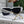 OBLIQUE SUNGLASS 571600 IN WHITE METAL BLACK MIRROR LENSES