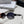 TRIOMPHE SUNGLASSES 573247 IN METAL GRADIENT SMOKE LENSES