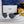 TRIOMPHE SUNGLASS 538530 IN WHITE ACETATE BLACK LENSES