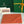 SÉNAT MGM POUCH 40 IN RED ORANGE GOYARDINE CANVAS