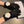 GLOVES IN BLACK WOOL WITH LARGE WHITE FLOWER 464993