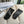 TOUCHSCREEN GLOVES IN BLACK MIX WHITE LAMBSKIN AND MONOGRAM JACQUARD FABRIC 465792