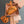MICRO BAG KEYCHAIN 11 IN HOT CINNAMON ORANGE CALFSKIN EMBOSSED LOGO