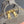 MICRO BAG KEYCHAIN 11 IN CLAY GREY CALFSKIN GOLD HARDWARE EMBOSSED LOGO