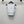 CC 25 Round Neck Knitted Embroidered Logo Vest in White 277575