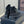 SHORT BOOTS IN BLACK GRAIN PEBBLE CALFSKIN