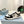 PRA DOWNTOWN PERFORATED SNEAKERS BLACK AND WHITE CALFSKIN