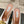 ALAIA SPIKE JEWEL MULES IN WHITE CALFSKIN WITH GOLD HARDWARE
