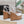 ALAIA WEDGE SANDAL IN WHITE GLOSSY CALFSKIN AND BEIGE RUBBER