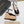ALAIA WEDGE SANDAL IN BLACK GLOSSY CALFSKIN AND BEIGE RUBBER