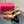 VLOGO SIGNATURE GINGER ORANGE PATENT LEATHER SLINGBACK PUMP 80MM