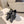 POINTED-TOE FLATS WITH BOW IN BLACK SOFT LAMBSKIN
