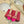 ROCKSTUD MULE SANDALS IN BRIGHT PINK CALFSKIN AND TRANSPARENT PVC FILM