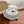 MM BUCKET IN WHITE FABRIC WITH BLACK EMBROIDERED PATTERN
