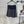 MIUMIU PLEATED LOW-BACK SIDE-SLIT MIDI SKIRT 275985