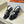 HM 26ss Kelly Sliver Buckle Sandals 65 Black Calfskin 607171