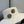 FLAT STRAW HAT WHITE FLOWER ATTACHMENT 673931