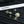 PENDANT EARRINGS IN GOLD METAL WHITE CRYSTAL TWISTED RIBBED DOUBLE C