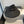 MM OPEN-TOP STRAW HAT IN BLACK WITH LARGE BOW