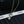 PENDANT NECKLACE IN GOLD TWISTED RIBBED DOUBLE C