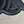 SMALL BUCKET CUIR TRIOMPHE 24CM IN STRIPED TEXTILE AND BLACK CALFSKIN