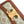 TEEN TRIOMPHE 18.5CM BEIGE MONOGRAM CANVAS AND TAN CALFSKIN